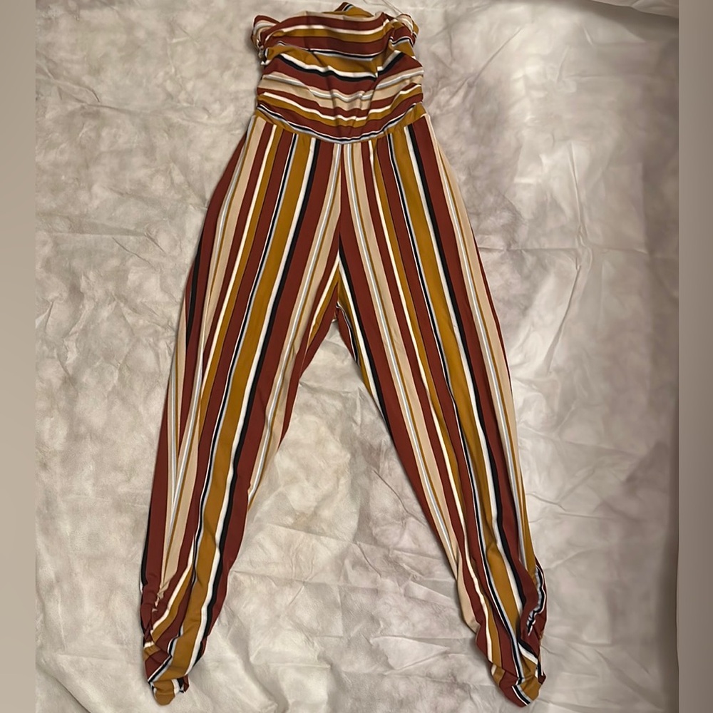 Multi Colored Romper. Size medium.